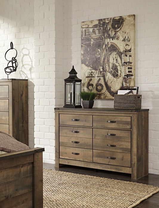 Trinell - Six Drawer Dresser - 61.34" x 15.98" x 42.99" - Brown Dark